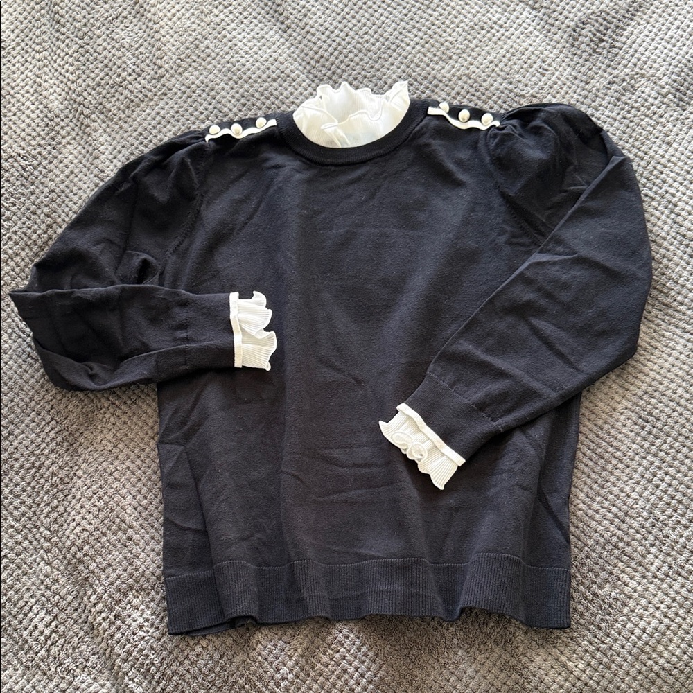 CeCe Black Top with White Ruffle Accents